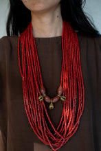 Load image into Gallery viewer, Goulu statement beaded necklace in beads and brass bell
