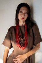 Load image into Gallery viewer, Goulu statement beaded necklace in beads and brass bell
