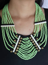 Load image into Gallery viewer, Goulu Timeless Lime Green Seed Beads with Brass Bell Necklace
