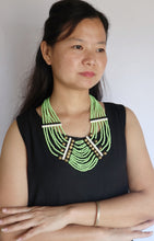 Load image into Gallery viewer, Goulu Timeless Lime Green Seed Beads with Brass Bell Necklace
